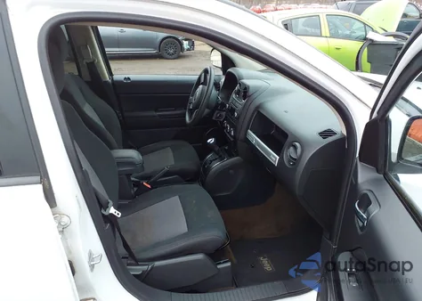 2014 Jeep Compass Sport z USA, uszkodzony, nr VIN 1C4NJDBB0ED621781